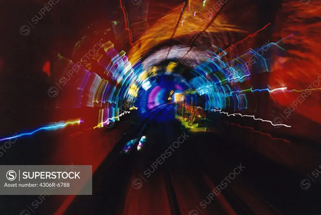 Vehicle in motion inside tunnel
