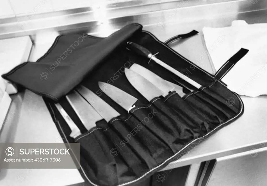 Kitchen knives in black leather case
