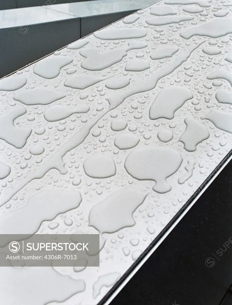 Water drops on chrome surface