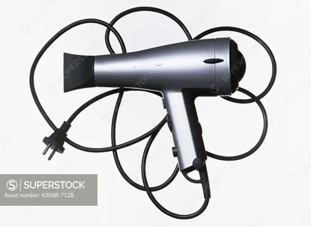 Close-up of hair dryer against white background