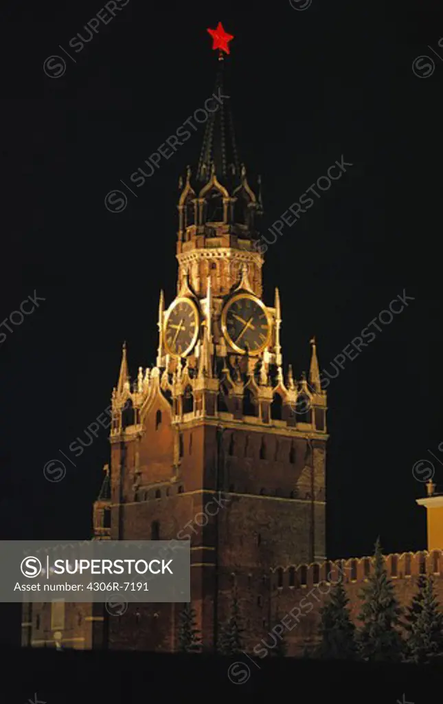 View of clock on church building at night