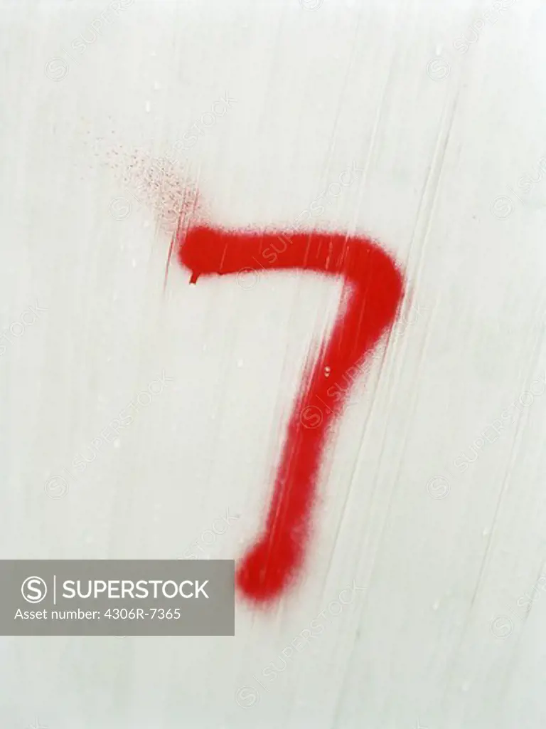 Number seven written on white background