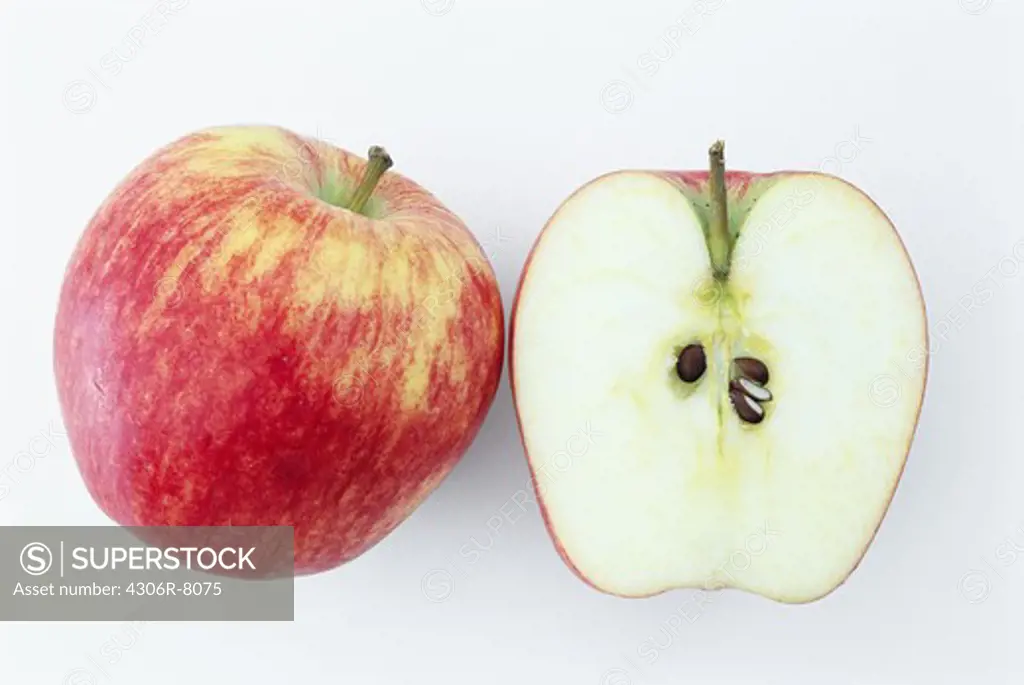Cross section of apple on white background