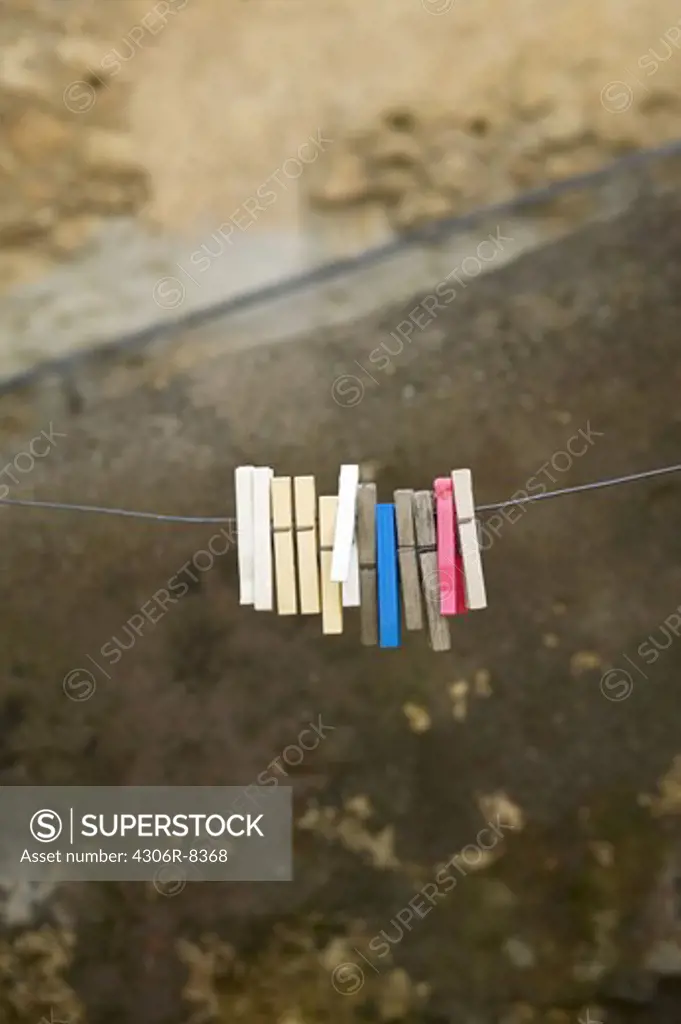 Row of clothes peg on washing line