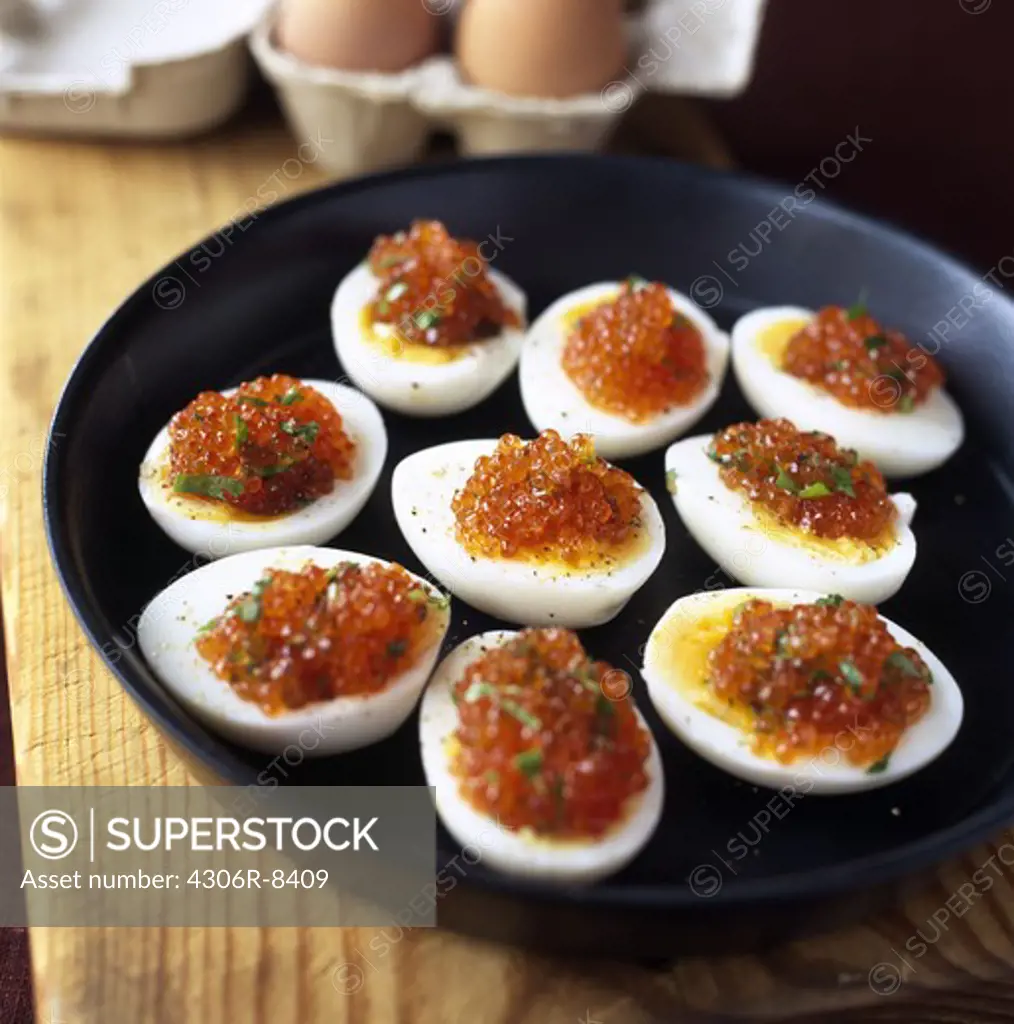 Snack of devilled eggs on plate at Easter