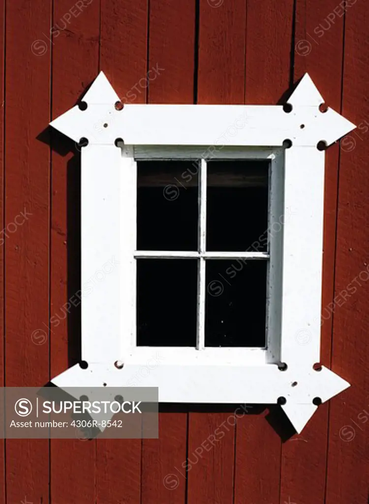 White window frame with red wall