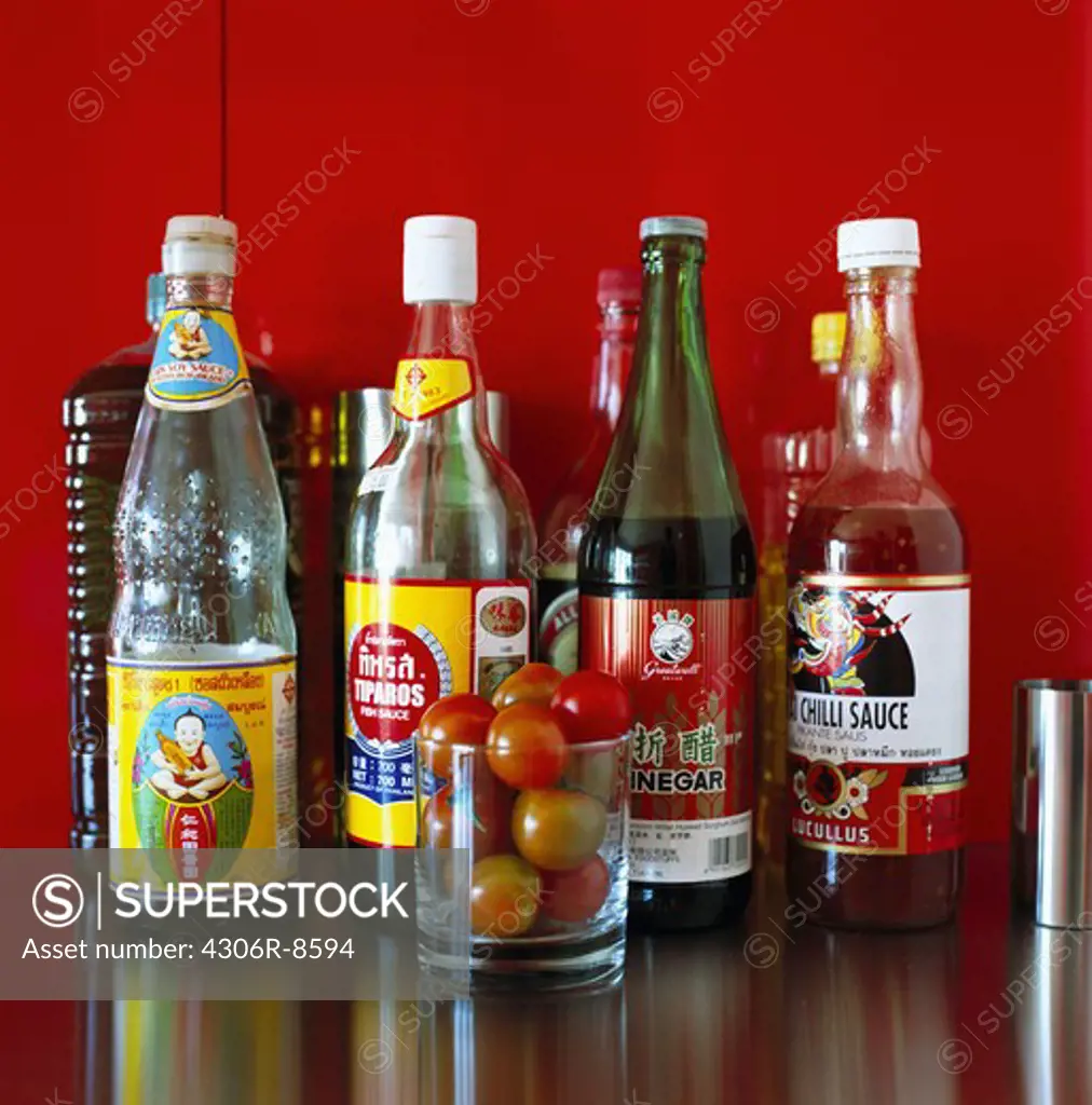 Bottles with soy and other sauces.
