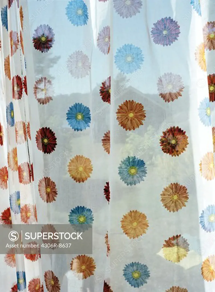 Close-up of floral patterned curtain