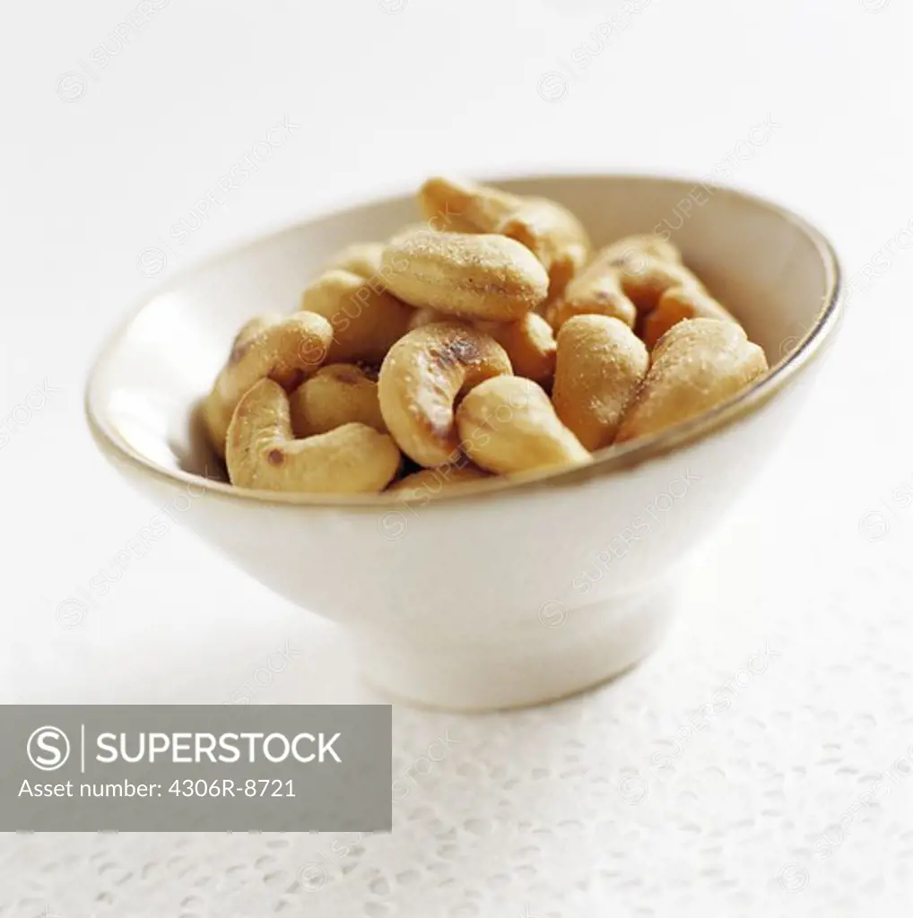 A bowl with cashews, close-up.