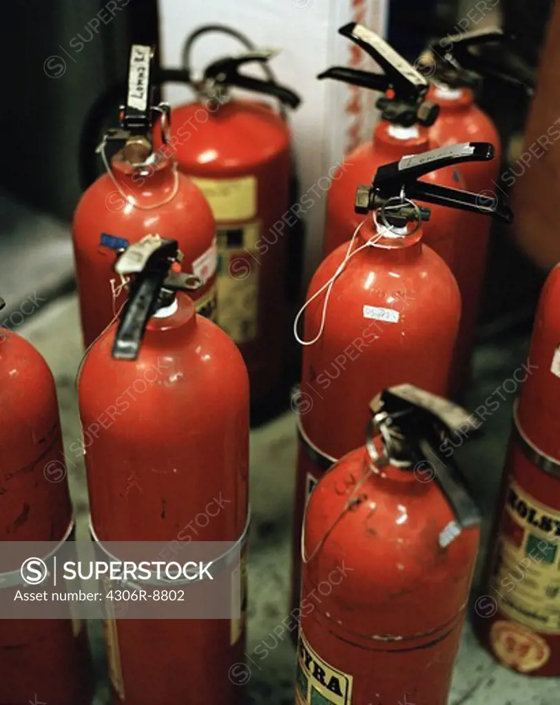 A number of fire-extinguishers.