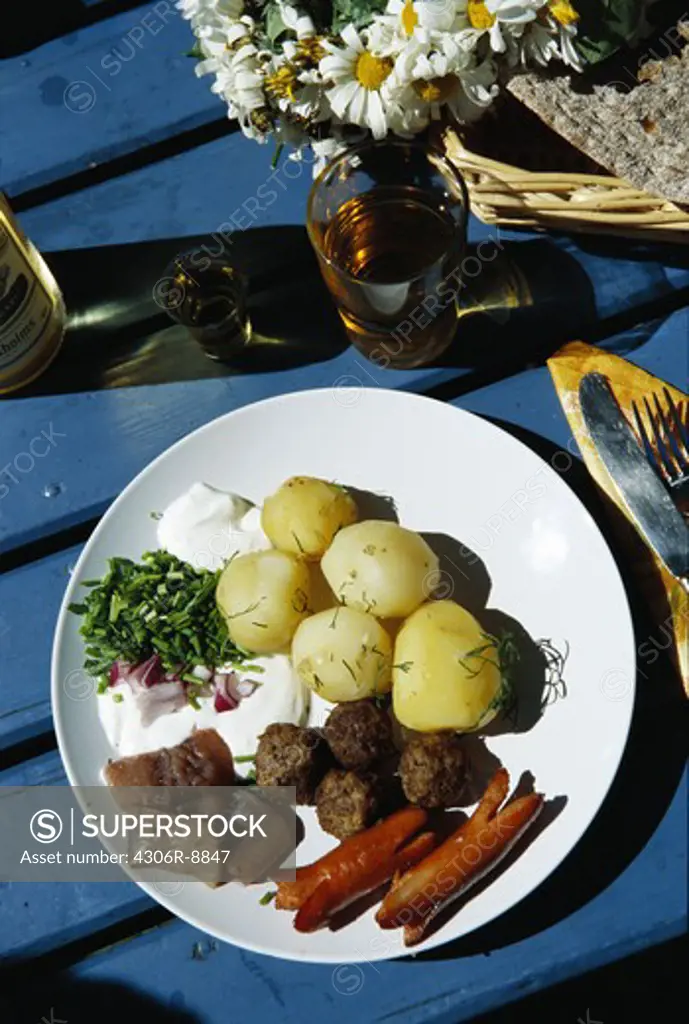 A plate with traditional midsummer food.