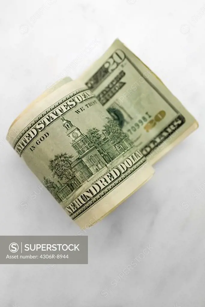 A roll of dollar bills.