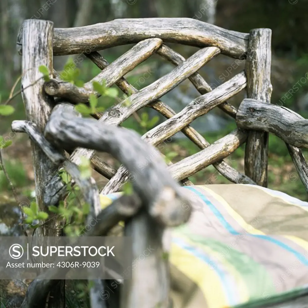 A wooden garden chair, close-up.
