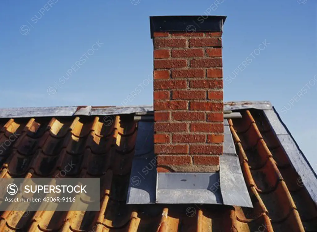 A chimney on a roof.