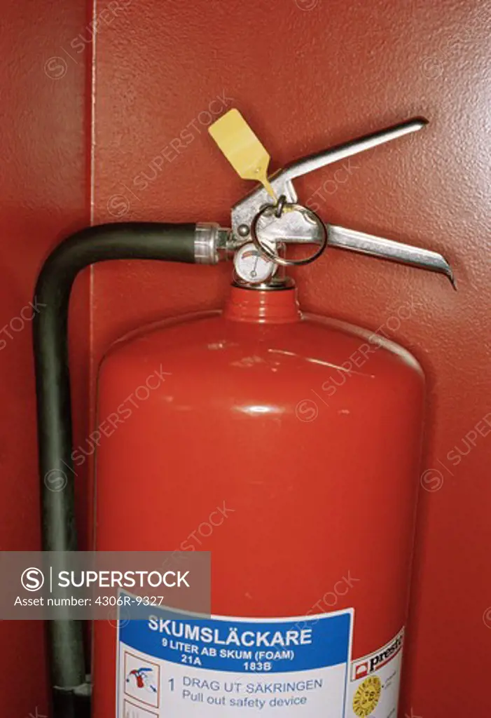 A fire extinguisher, close-up.
