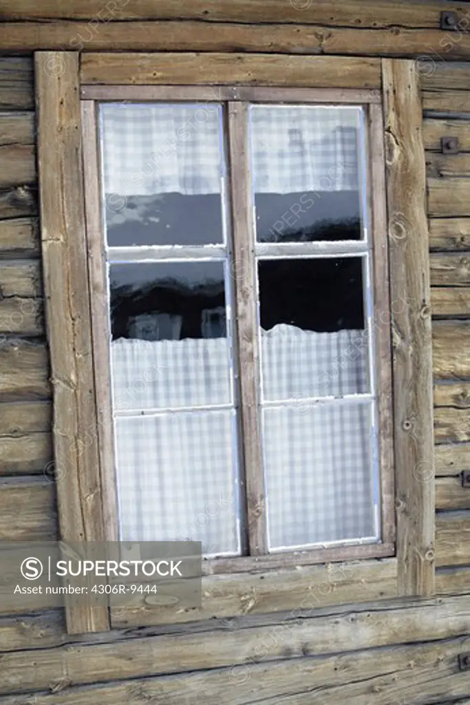 A window on a log house.