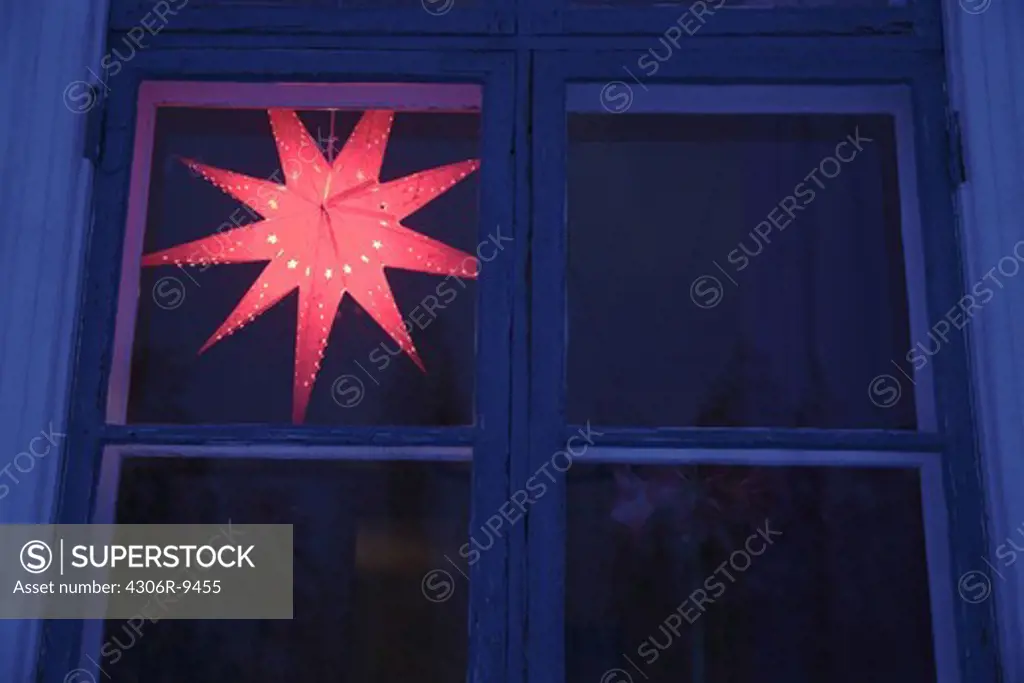 An Advent star in a window.