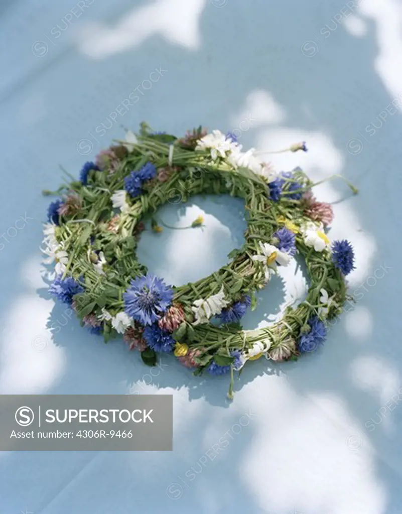 Midsummer wreaths on a table.