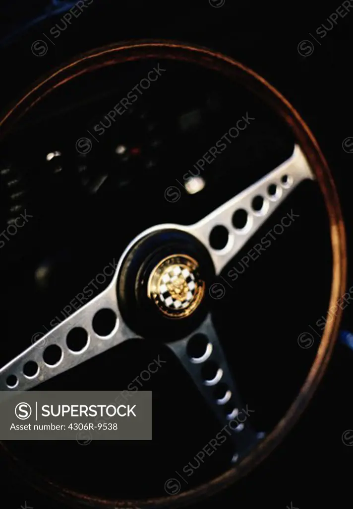A steering-wheel in a Jaguar.