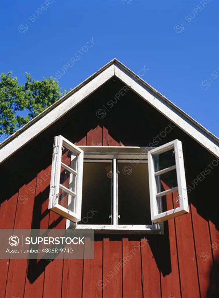 Open windows on a house.