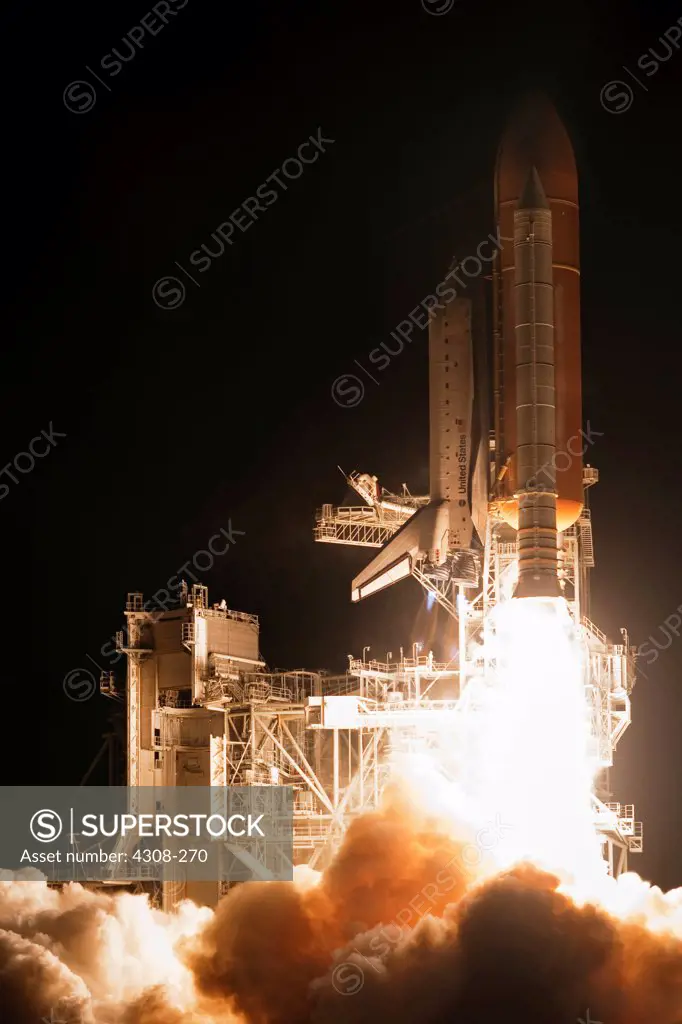 CAPE CANAVERAL, Fla. - Propelled by an estimated 7 million pounds of thrust from two solid rocket boosters and three main engines, space shuttle Endeavour races to orbit from Launch Pad 39A at NASA's Kennedy Space Center in Florida. Launch of the STS-130 mission to the International Space Station was at 4:14 a.m. EST. This was the second launch attempt for space shuttle Endeavour's STS-130 crew and the final scheduled space shuttle night launch. The first attempt on Feb. 7 was scrubbed due to un