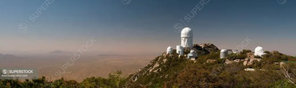 Kitt Peak National Observatory, Arizona, is seen in this panorama. The largest 4-meter Mayall telescope dome dominates the mountaintop.