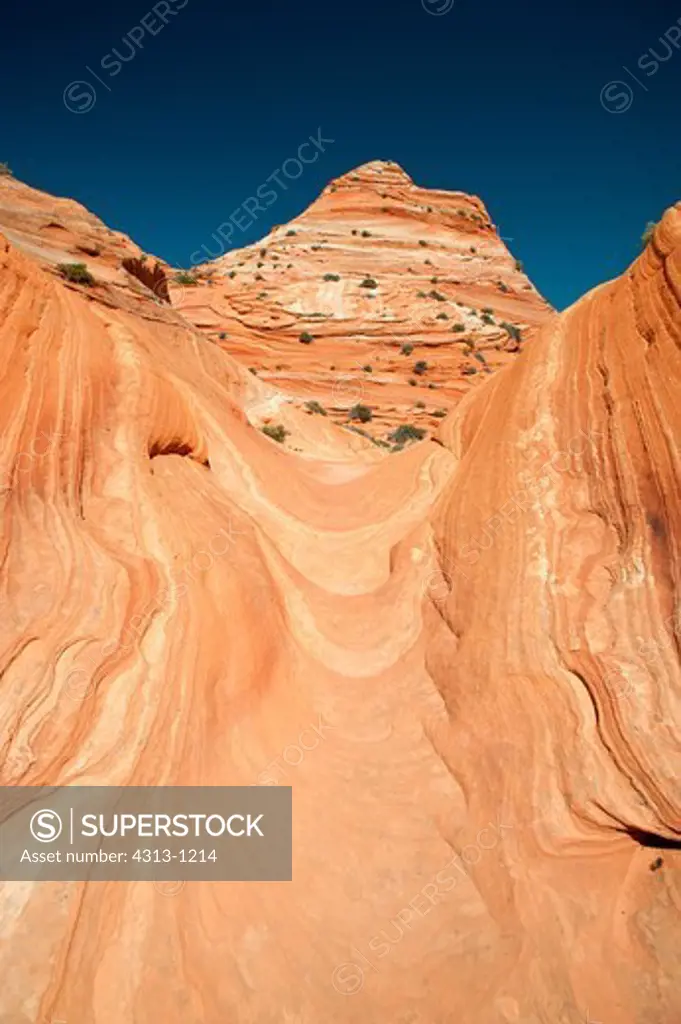 Layers of sandstone make patterns in the desert in North Coyote Buttes, on the Arizona-Utah border