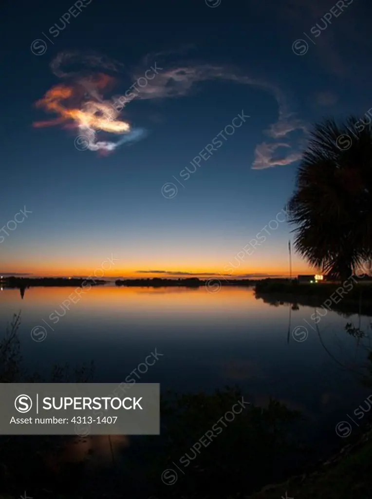 USA, Florida, Cape Canaveral, Kennedy Space Center, View of smoke plume after Discovery space shuttle on STS-131 mission on April 5, 2010