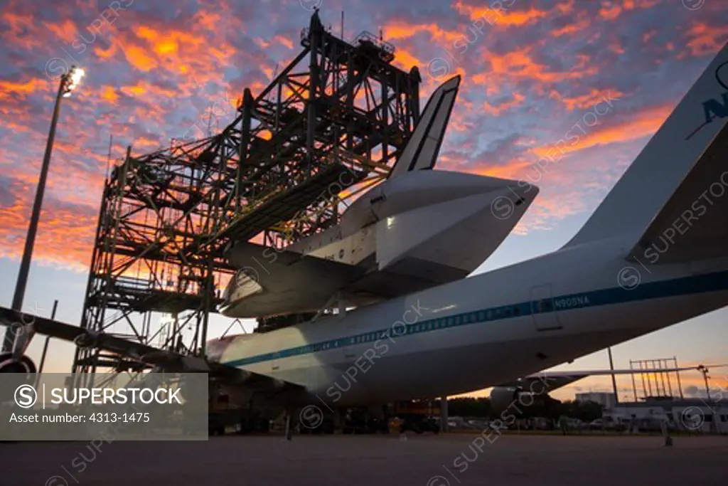 USA, Florida, Cape canaveral, Kennedy Space Center, Elevated View of Endeavour space shuttle lifting on top of 747 shuttle carrier aircraft