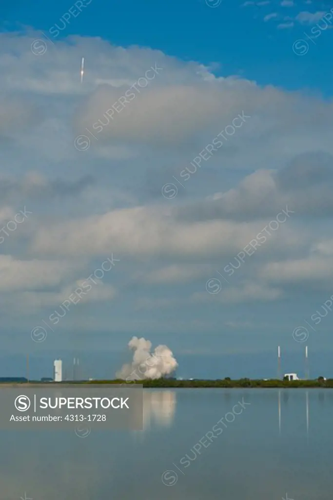 USA, Florida, Cape Canaveral, view of space rocket taking off. A United Launch Alliance (ULA) Atlas V (Atlas 5) rocket launches the X-37B Orbital Test Vehicle (OTV) unmanned space plane on its third mission on December 11, 2012.