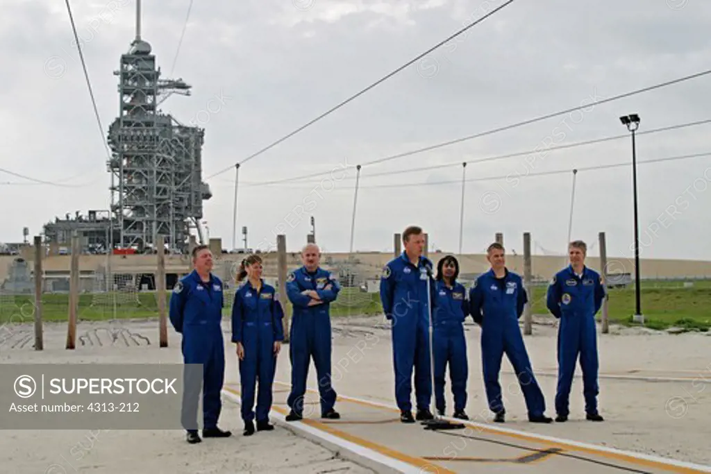 The crew of STS-121, including Lisa Nowak who would become infamous the next year, train for launch at Pad 39A for STS-121. Left to right are Mission Specialists Mike Fossum and Lisa Nowak; Pilot Mark Kelly; Commander Steve Lindsey; and Mission Specialists Stephanie Wilson, Piers Sellers and Thomas Reiter of the European Space Agency who will remain aboard the ISS for several months.