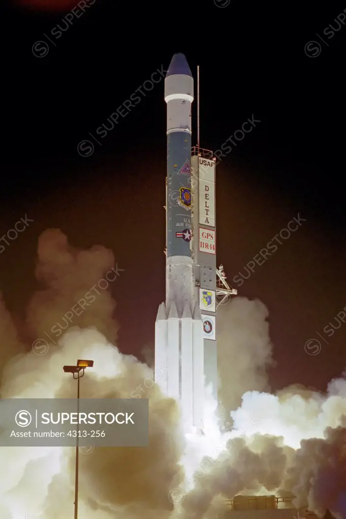 A Delta II rocket launches Global Positioning System satellite IIR-14M.