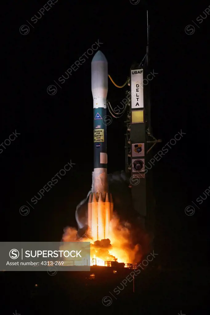 A Delta II rocket launches NASA's Kepler telescope, the first telescope designed to seek out Earth-like planets in our galaxy.