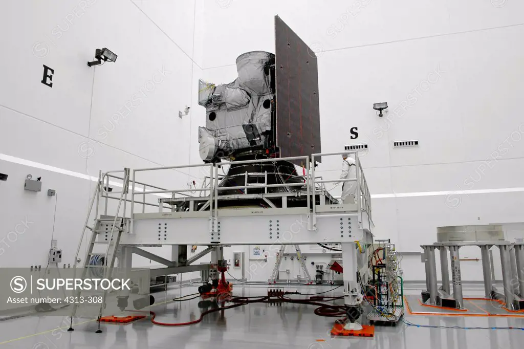 NASA and  NOAA's GOES-N (Geostationary Operational Environmental Satellite) weather satellite is prepared for launch inside a cleanroom near Kennedy Space Center.