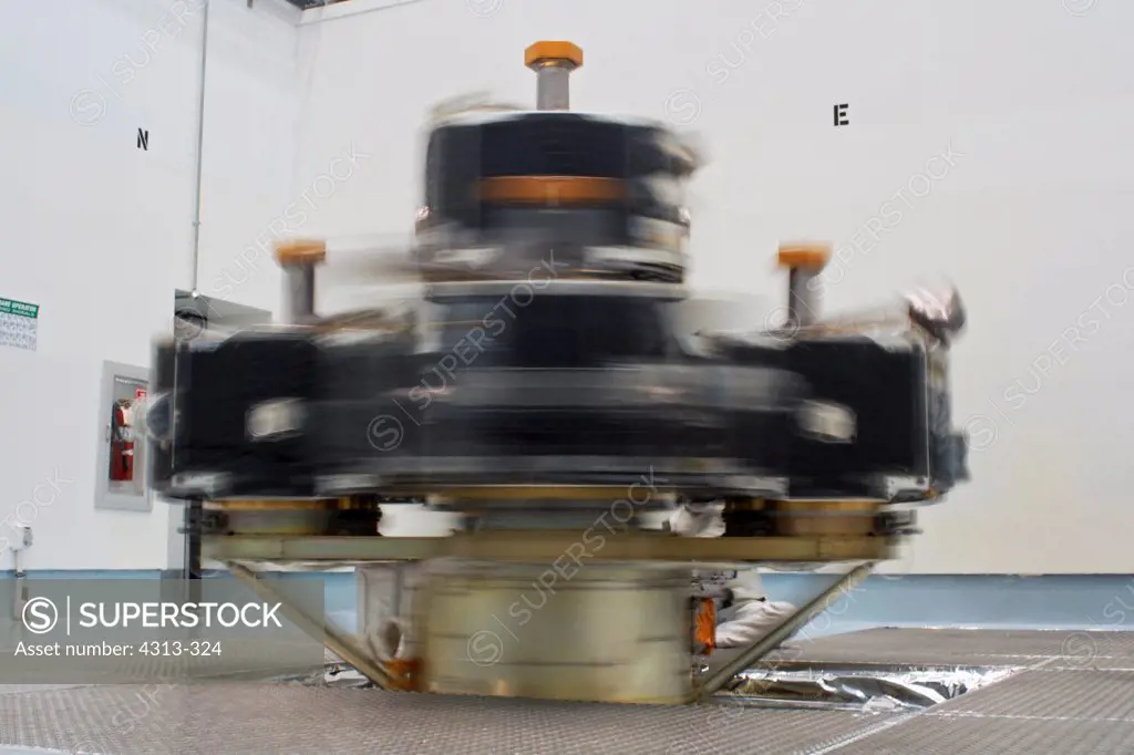 NASA's Time History of Events and Macroscale Interactions during Substorms, or THEMIS, spacecraft, consisting of five identical cube-shaped satellites, is prepared for launch on a spin-table in a cleanroom near Kennedy Space Center. Here, a short time-lapse captures the motion of the spinning upper-stage of the Delta II rocket.