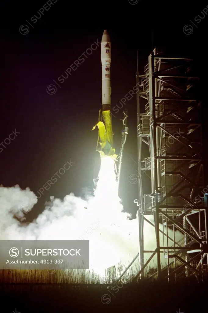 The first Minotaur 1 rocket launches from the new Mid-Atlantic Regional Spaceport (MARS) at NASA's Wallops Island, Virginia, facility. It is the first orbital space launch from the island in a generation. Here, the yellow 'banana-peel' thermal insulation rips off the vehicle at liftoff. Onboard are the Tacsat-1 satellite for the US Air Force and GeneSat-1 spacecraft for NASA.