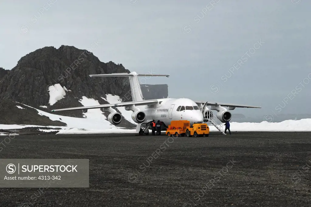 A BAE-146 aircraft on the gravel runway at Chile's Frei research base on King George Island, Antarctica.