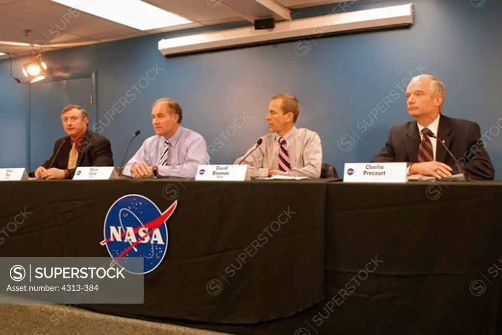 NASA and ATK chiefs at a press conference following final test firing of a space shuttle solid rocket booster.
