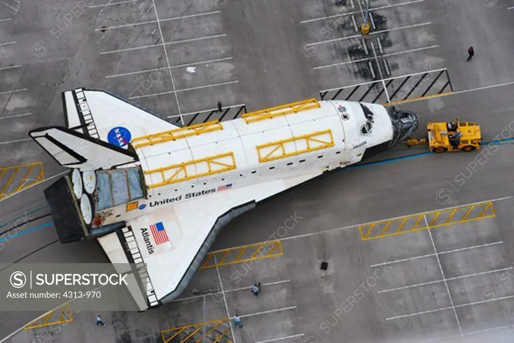 Space Shuttle Atlantis Moves from Vehicle Assembly Building to an Orbiter Processing Facility