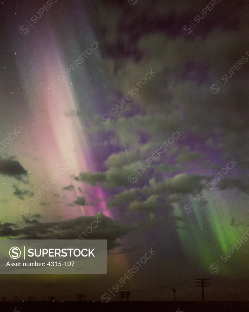 Red and Green Auroral Rays Over Havre Montana