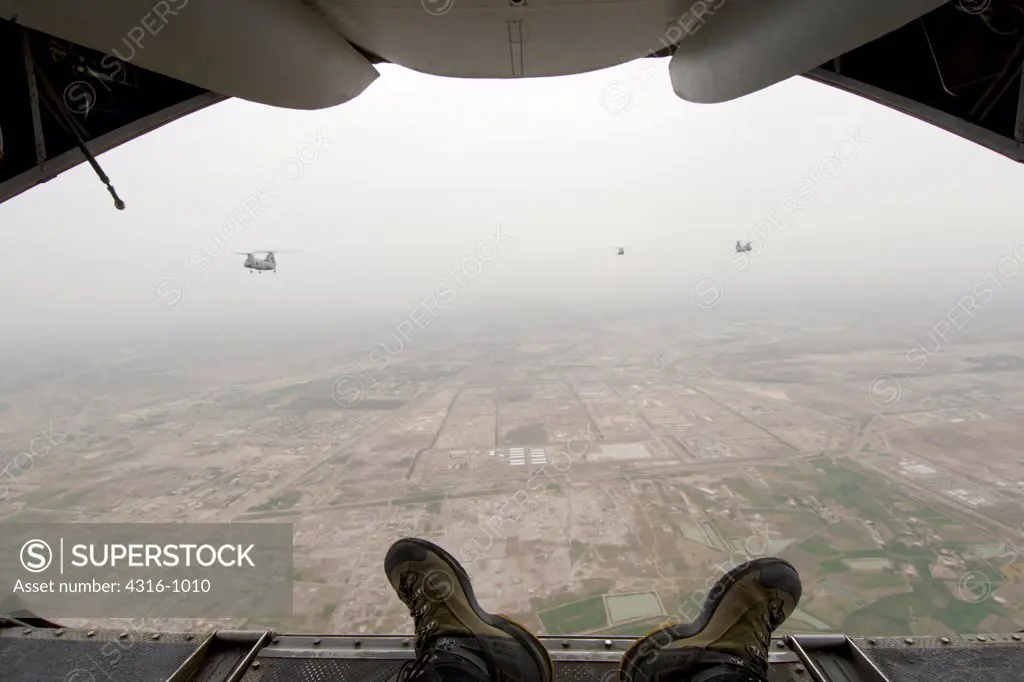 View from the Rear of a US Marine Corps CH-46 Sea Knight of other CH-46 Helicopters Above Baghdad, Iraq