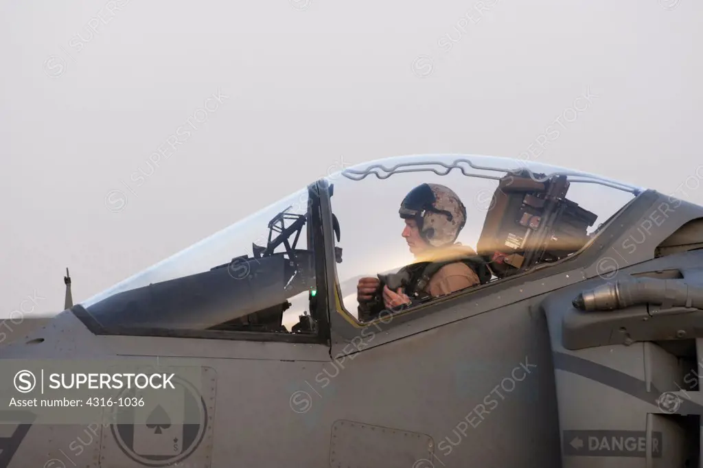 A US Marine Aviator Prepares to Launch His AV-8B Harrier From Al Asad Air Base in Iraq's Al Anbar Province