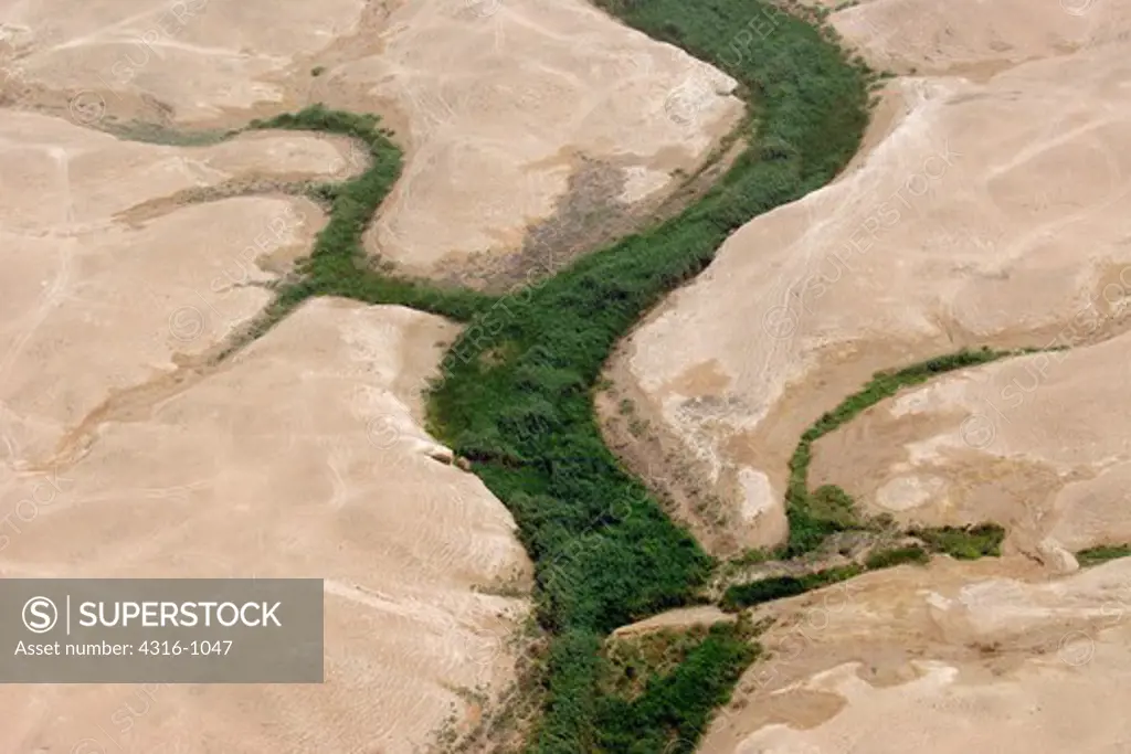 Aerial View of a Riparian Swath That Winds Through the Torrid Desert Near The City of Haditha in Iraq's Al Anbar Province
