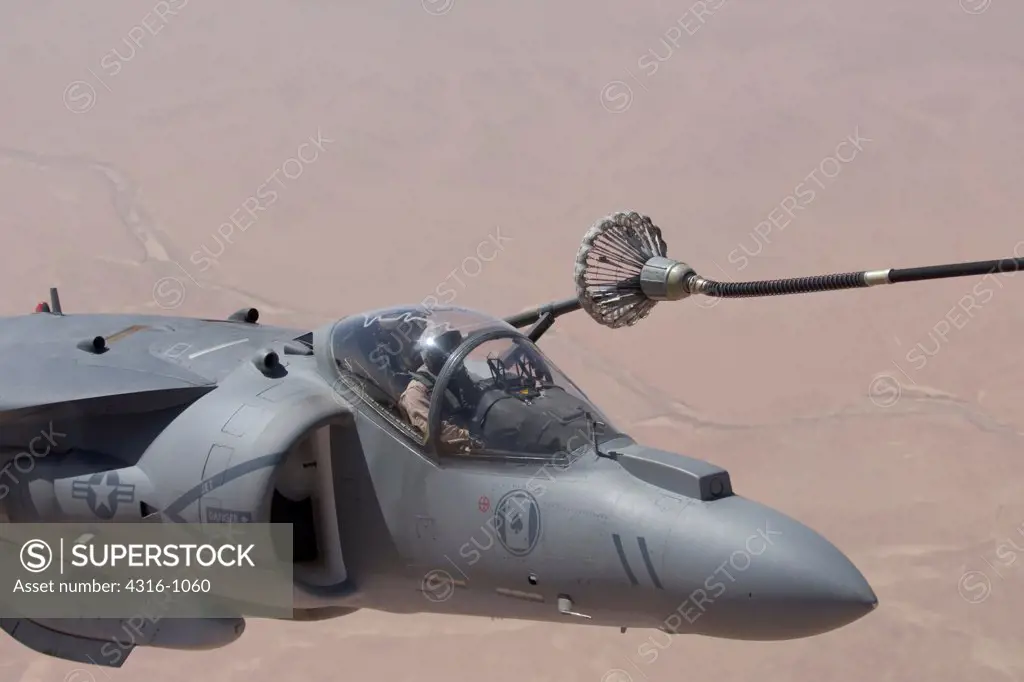 A US Marine Corps AV-8B Harrier During In Flight Refueling over Iraq's Al Anbar Province