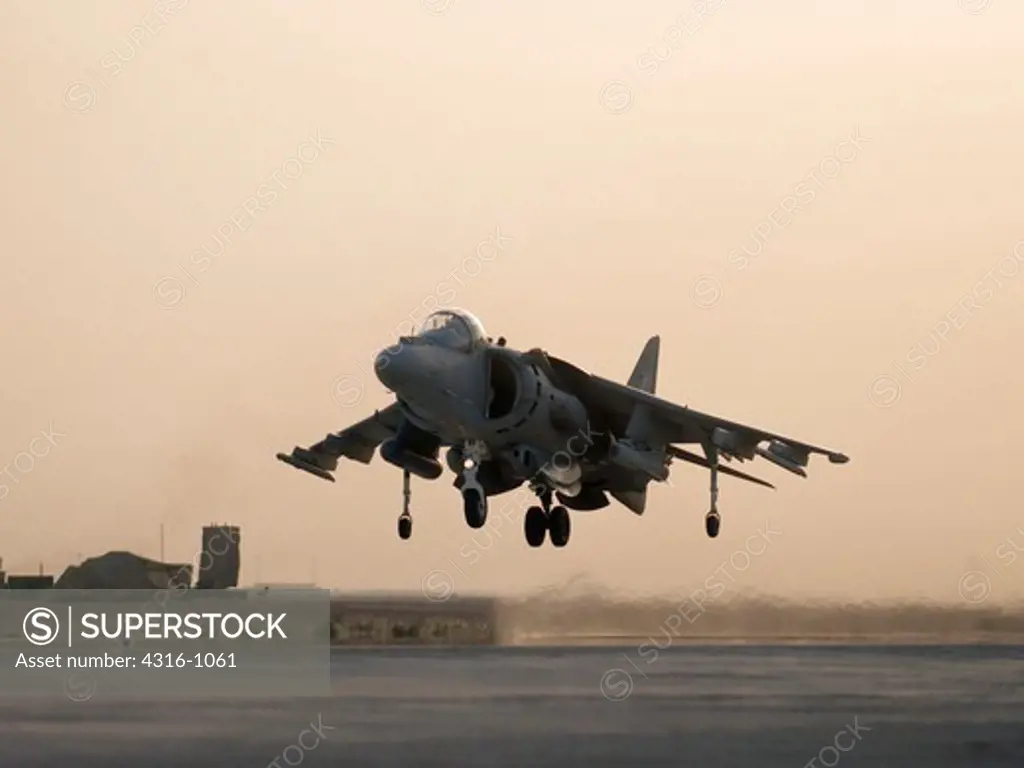 A US Marine Corps AV-8B Harrier Launches at Dawn from Al Asad Air Base in Iraq's Al Anbar Province