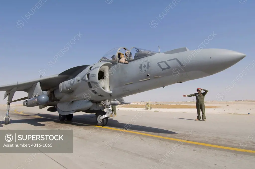 A US Marine Corps AV-8B Harrier Ready to Launch at Al Asad Air Base in Iraq's Al Anbar Province