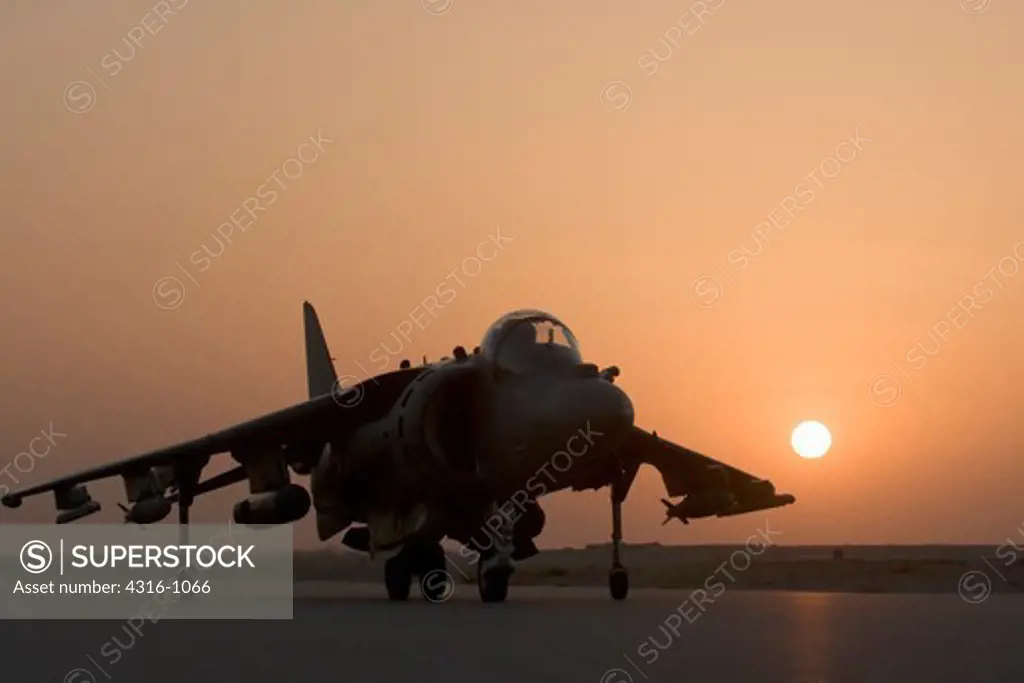 Sunset Landing of a US Marine Corps AV-8B Harrier at Al Asad Air Base in Iraq's Al Anbar Province