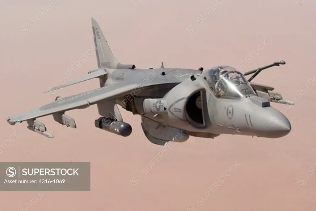 A US Marine Corps AV-8B Harrier Prepares to Refuel in Flight Above the Al Anbar Province of Iraq