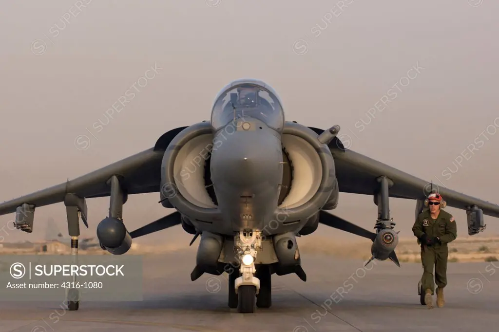 After a Ground Crew Has Armed All of The Weapons of the Aircraft, A US Marine Corps AV-8B Harrier Prepares to Launch from Al Asad Air Base in the Al Anbar Province of Iraq