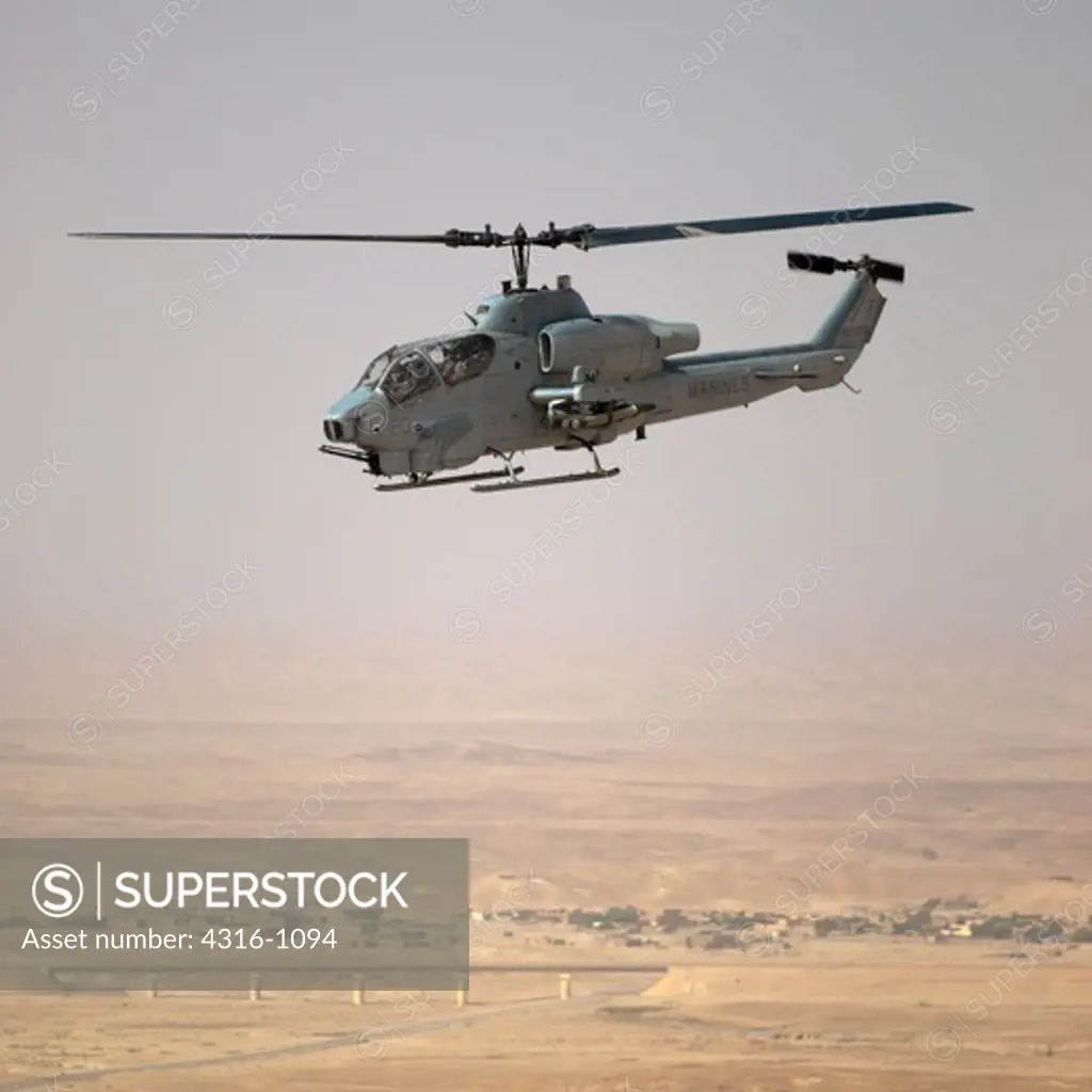 A US Marine Corps AH-1W Super Cobra During a Close Air Support Mission Above Iraq's Al Anbar Province